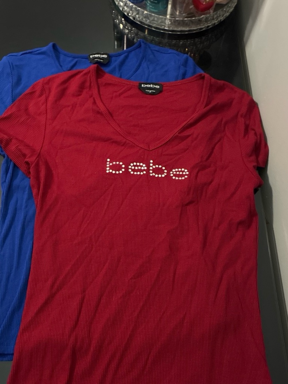 bebe Red Short Sleeve V-Neck Tee with Crystal Logo (Blue Tee Shown Behind)